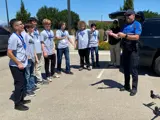 Police Officer demonstrating a drone to the Youth Safety Academy.
